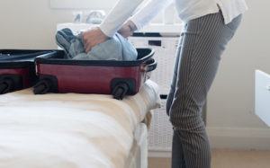 A recent divorcee packs their bags to move to another province